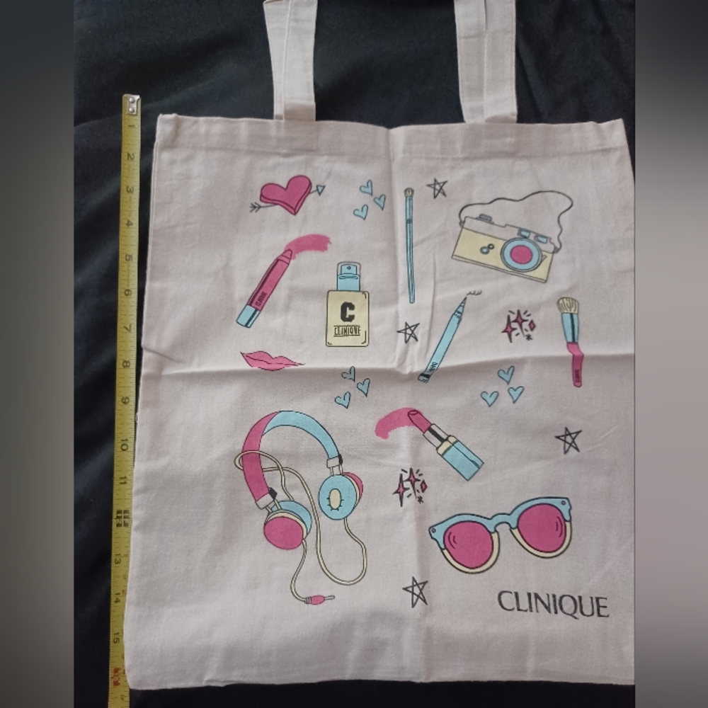 CLINIQUE LIGHT CANVAS TOTE 15"H X 14" W.
